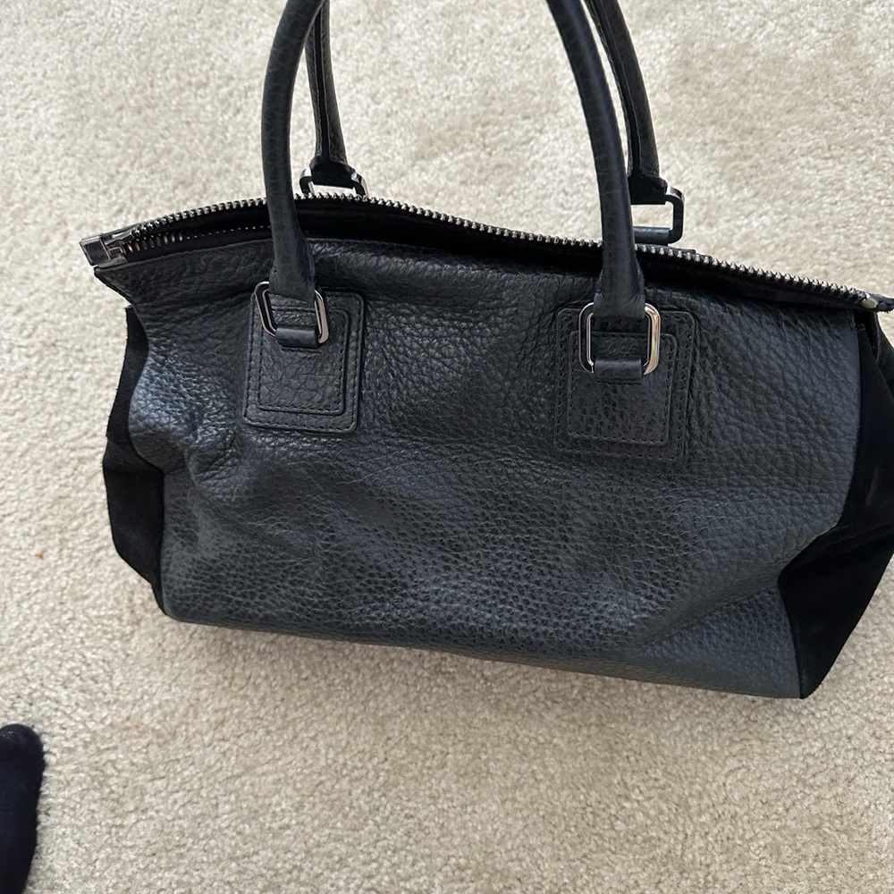 Love Alex black leather and suede handbag. Gently used.